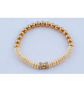 Adzo Designs bracelet-a duo of gold and cream glass pearls with gold finish diamante on stretch